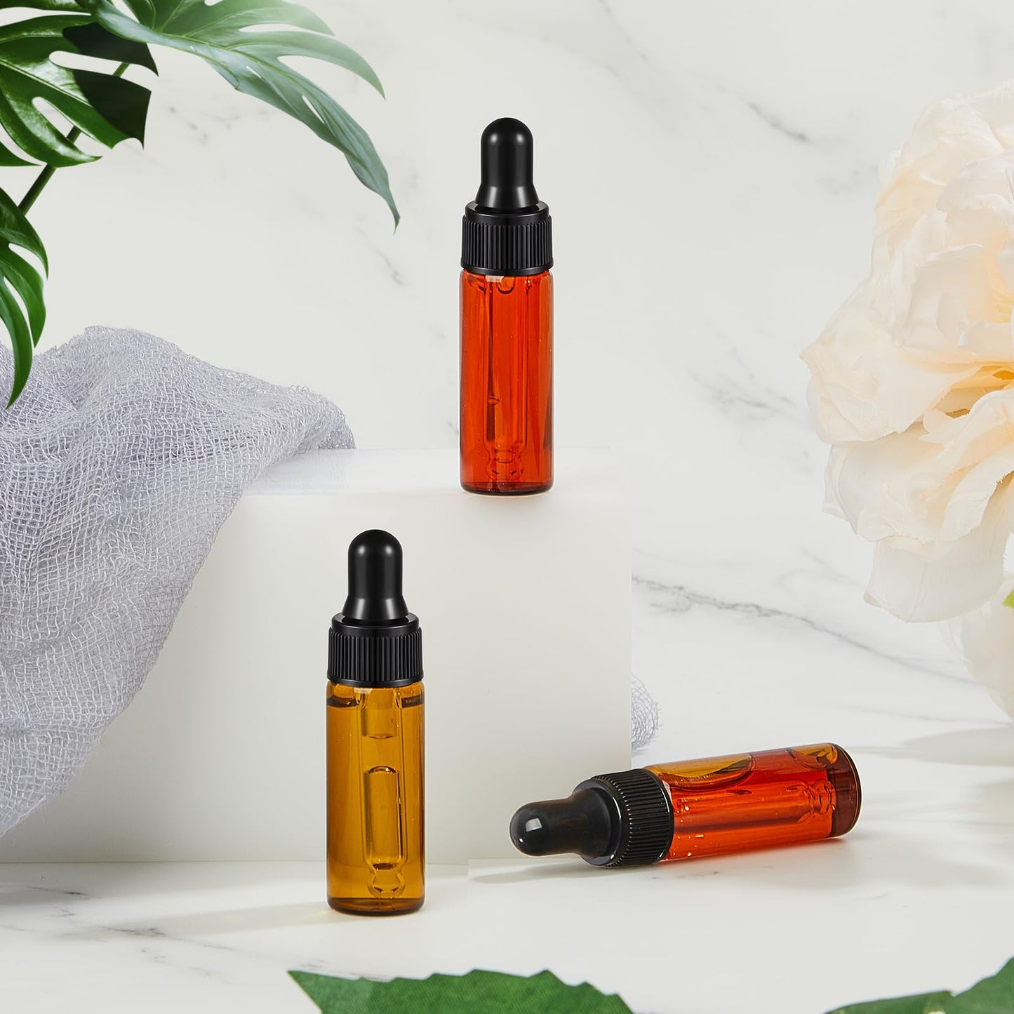 Didaey 200 Pcs 5 ml Mini Glass Oil Dropper Bottle Bulk, Clear Essential Small Empty Bottles Sample Containers Perfume Liquid Vials with Cap for Traveling (Amber)