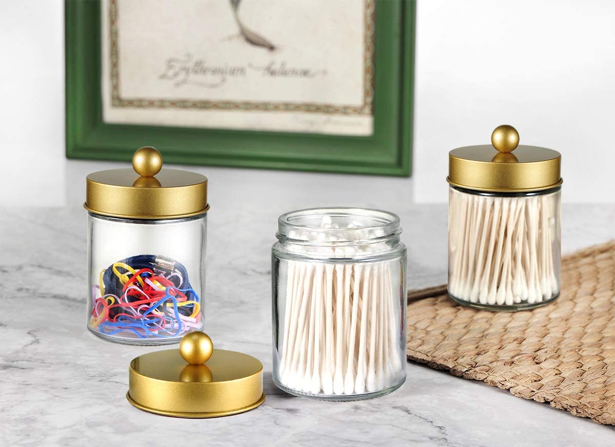 Amolliar 4 Pc Glass Apothecary Jars - Countertop Qtip Dispenser Holder with Stainless Steel Lids &Cute Stickers -Bathroom Vanity Storage Organizer Set for Qtips,Cotton Swabs,Makeup Sponges(Gold)