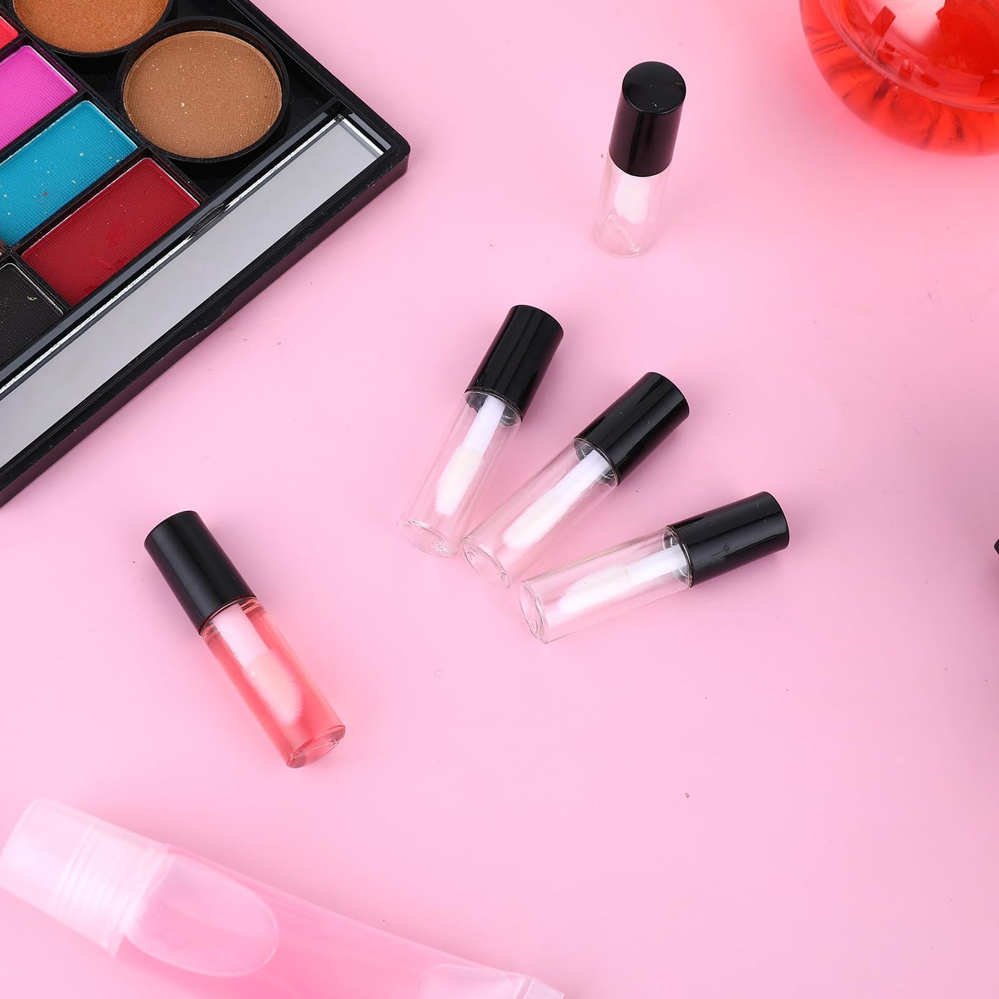 WLLHYF 100 Pcs Mini Lip Gloss Tubes, Refillable Lip Balm Bottle Transparent Empty Containers Travel Personal Cosmetic Inserts Cosmetic Tools Mini Lipstick Containers for Women DIY Makeup