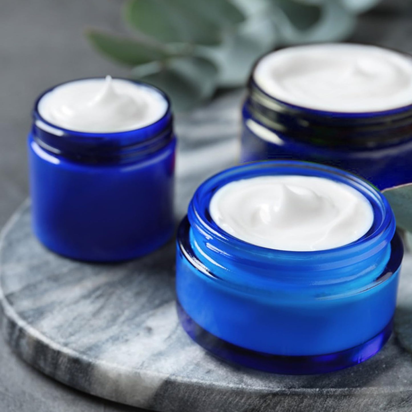 IRON BILL 1 Oz Blue Round Glass Jars with Inner Liners and Black Lids(12PCS) Empty Cream Containers Refillable Cosmetic Vials for Cosmetics, Lotions, Ointment, Body Scrubs & Balms