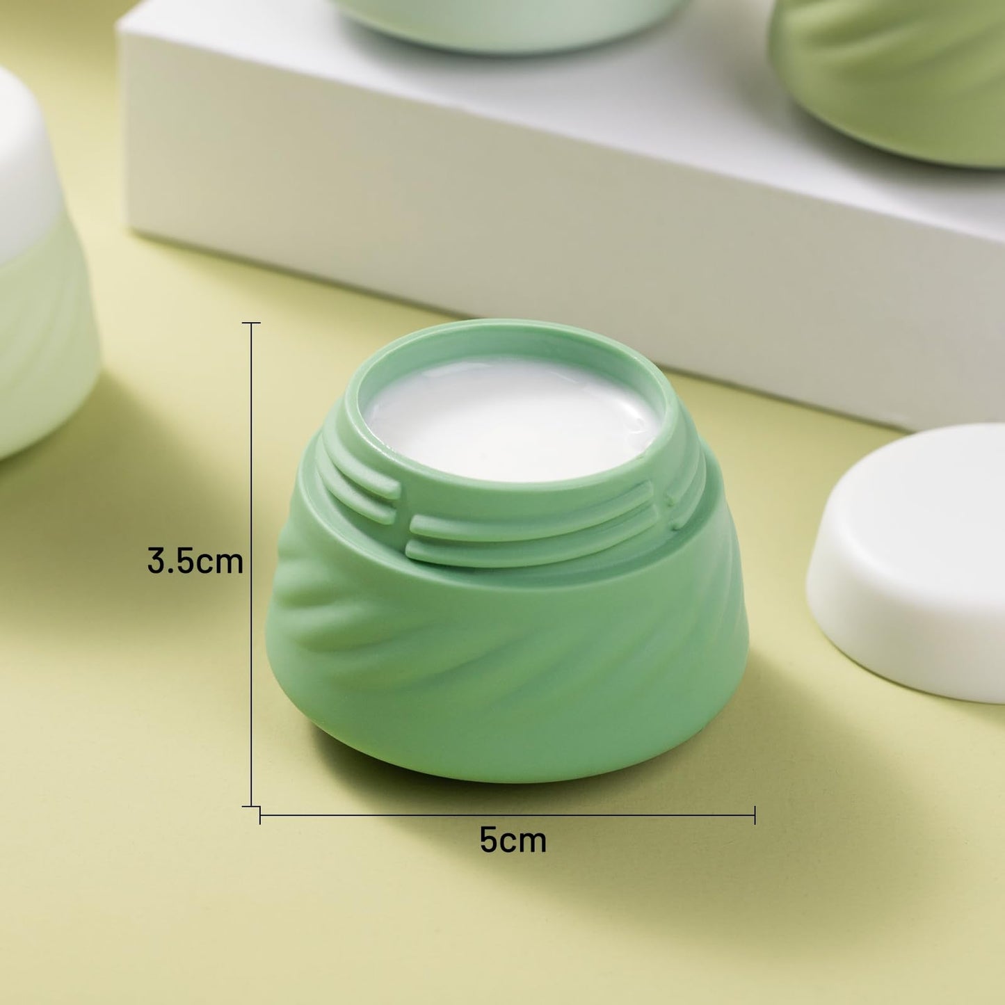Gemice Silicone Cream Jars TSA Approved Travel Size Containers with Clear Bag, Leak-proof Travel Accessories with Lid for Cosmetic Face Body Hand Cream (4 Pack)