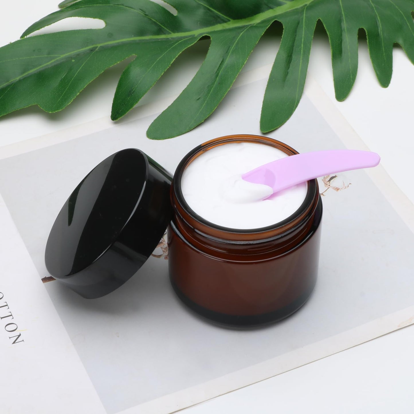 2oz Small Travel Containers with Black Lids,25 Pack Amber Glass Jars with Mini Disposable Spatula for Toiletries，Travel Storage，Makeup Beauty Products, Lotions, Powders and Ointments