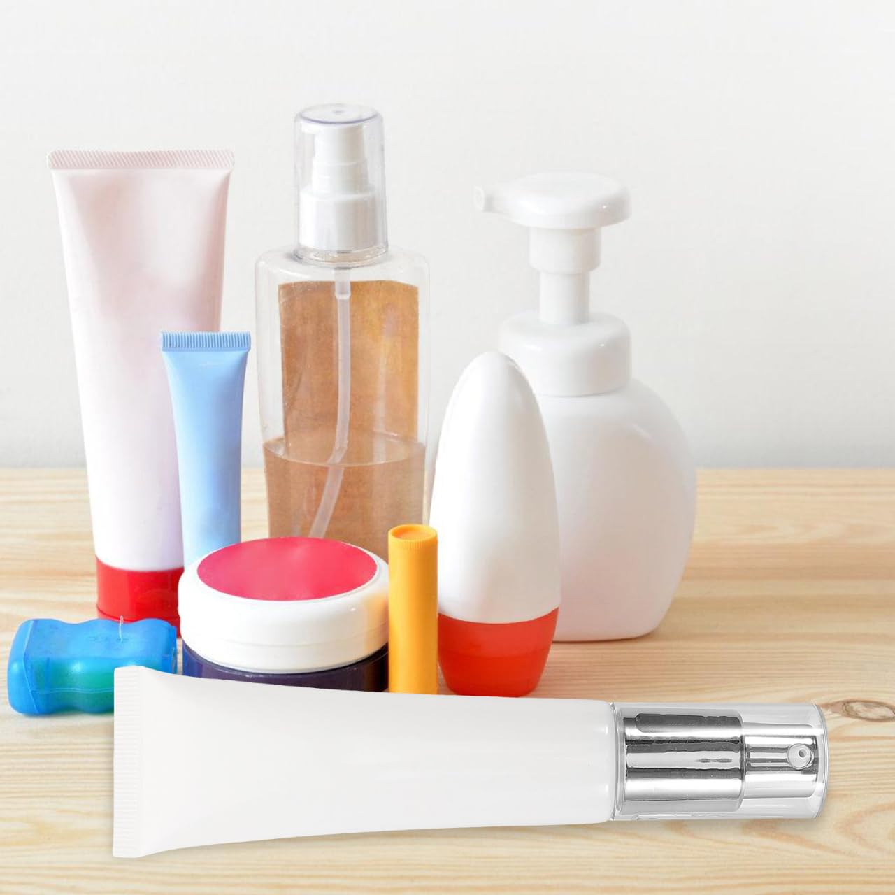 CALLARON Refillable Squeeze Bottle with Pump Dispenser Makeup Pump Dispenser for Lotion Cream and Foundation Travel Cosmetic Tube for Purse 5.51 X 1.57 X 1.18 in 1 Pack