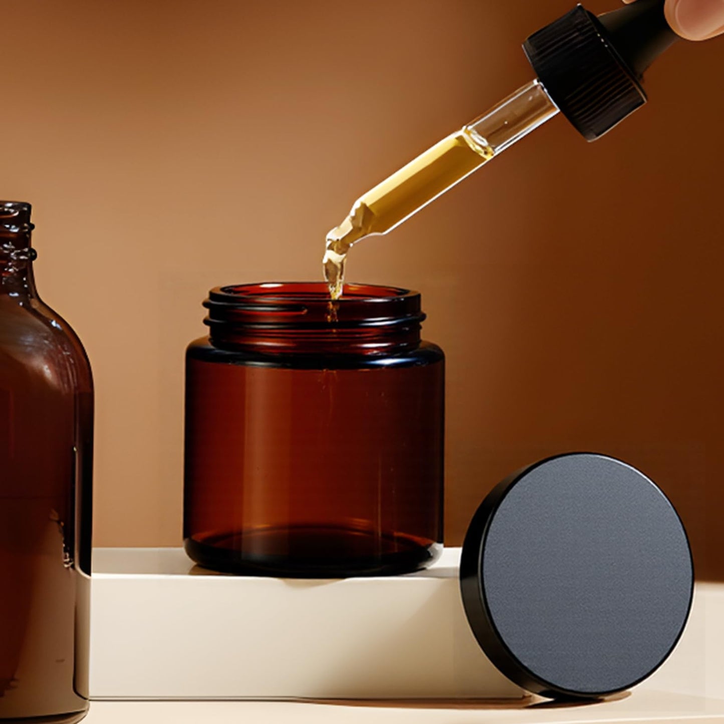 4 oz Glass Jars with Lids, Hoa Kinh 40 Pack Amber Small Glass Jars with Black Lids Empty Cosmetic Containers Airtight Round Glass Jar for Lotions, Powders and Ointments