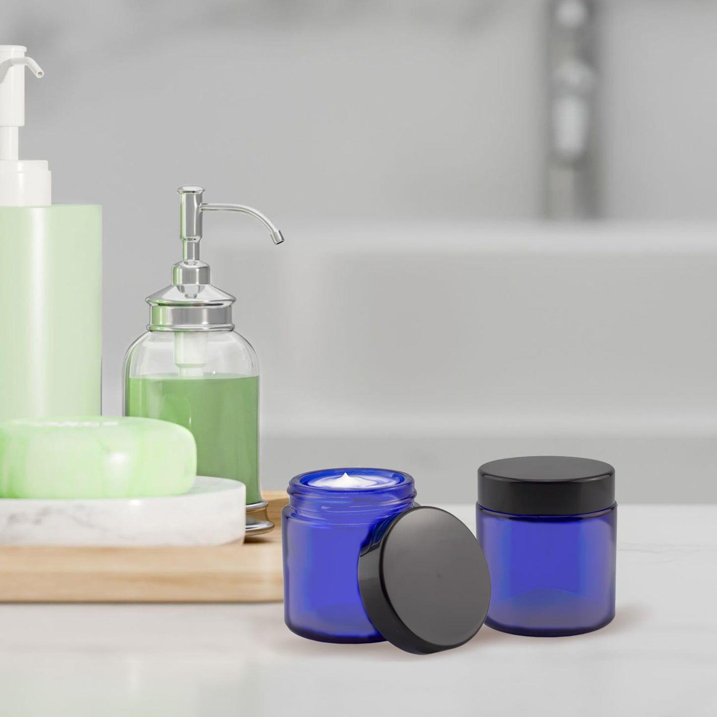 Cornucopia Brands 2oz Cobalt Blue Glass Cosmetic Jars (Pack of 12) Straight Sided Jars w/Black Plastic Lined Lids for Balms, Cosmetics, Creams & More