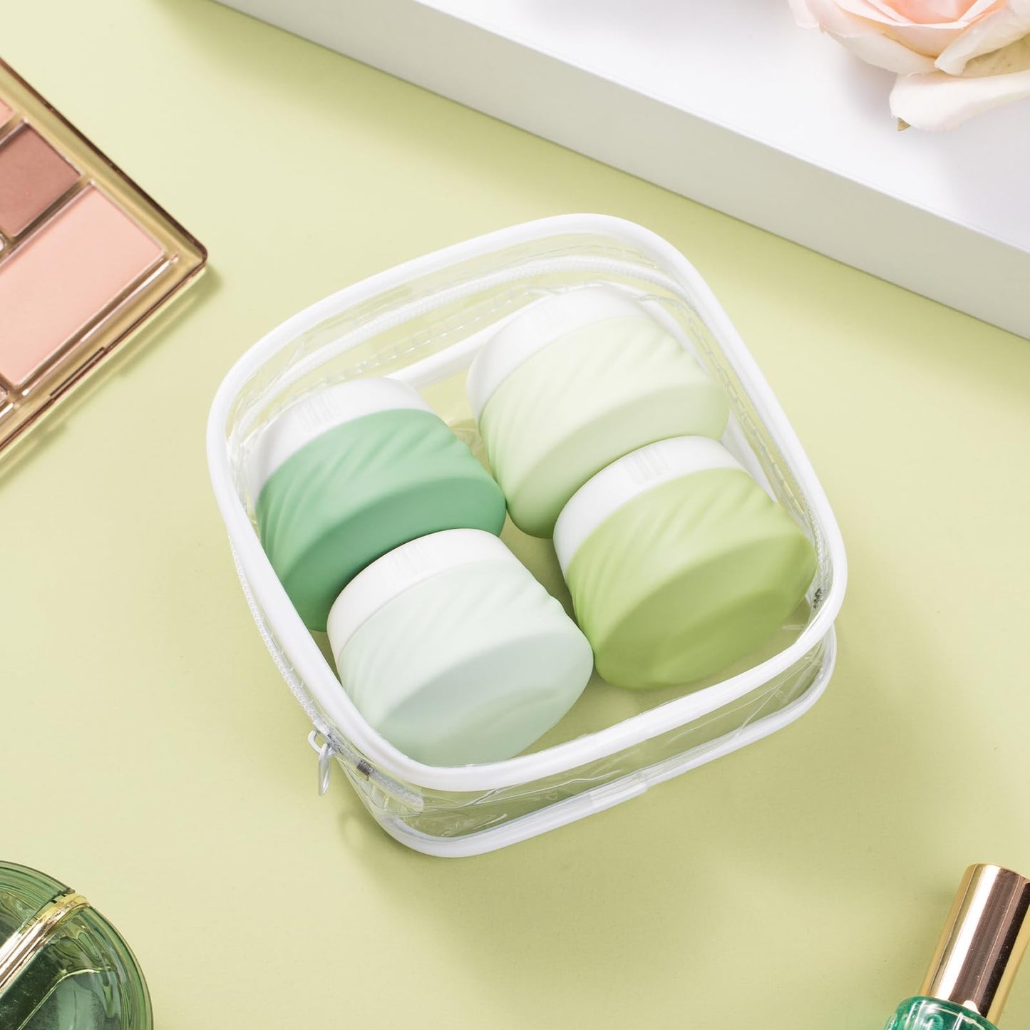 Gemice Silicone Cream Jars TSA Approved Travel Size Containers with Clear Bag, Leak-proof Travel Accessories with Lid for Cosmetic Face Body Hand Cream (4 Pack)