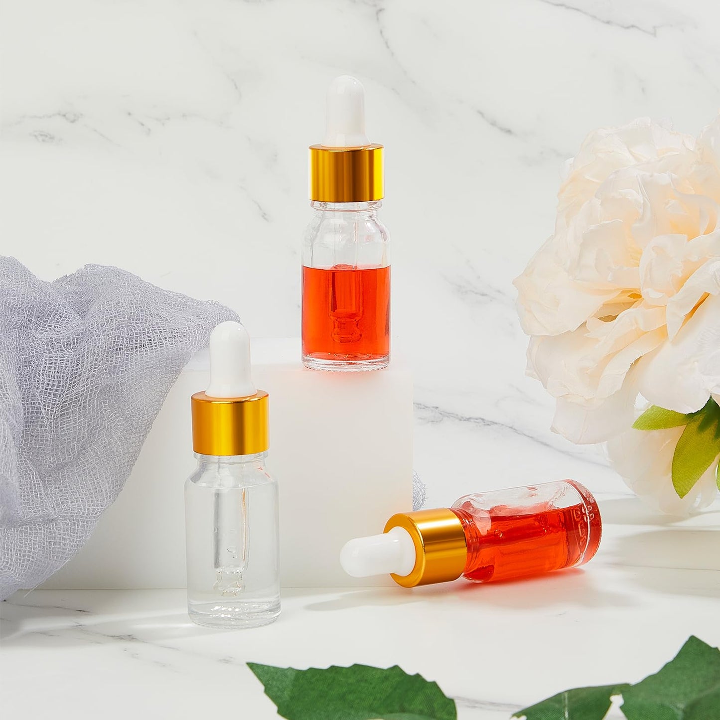Didaey 100 Pcs 10 ml Mini Glass Oil Dropper Bottle Bulk, Clear Essential Small Empty Bottles Sample Containers Perfume Liquid Vials with Cap for Traveling (Champagne Gold)