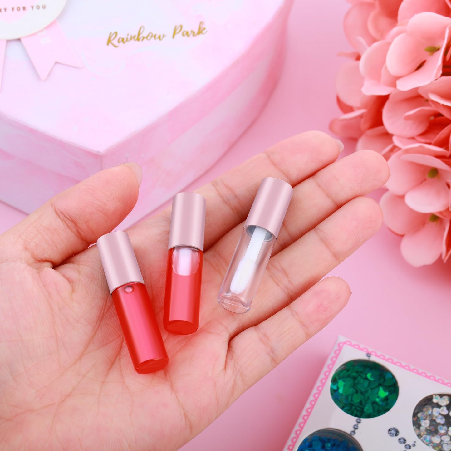 Patelai 100 Pieces 1.2 ml Empty Lip Gloss Tubes Refillable Mini Lip Balm Gloss Containers for Different Samples Travel Split DIY Makeup, Pink