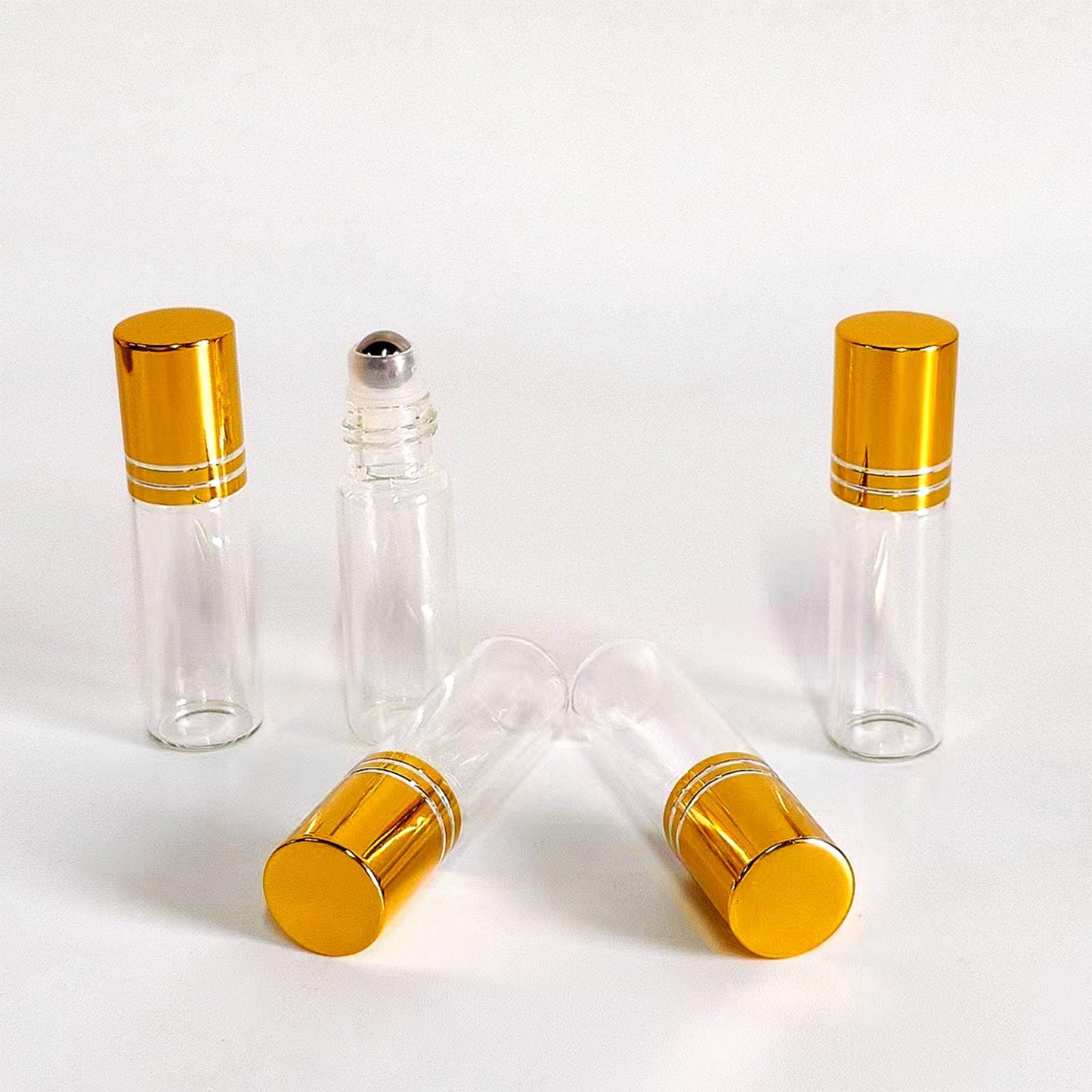 PYAWI 50 PCS 5ml Clear Glass Essential Oil Roller Bottles with Stainless Steel Roller Ball,Gold Caps,for Travel Perfume-2 Funnels, 2 Dropper, 1 Opener (5ml)