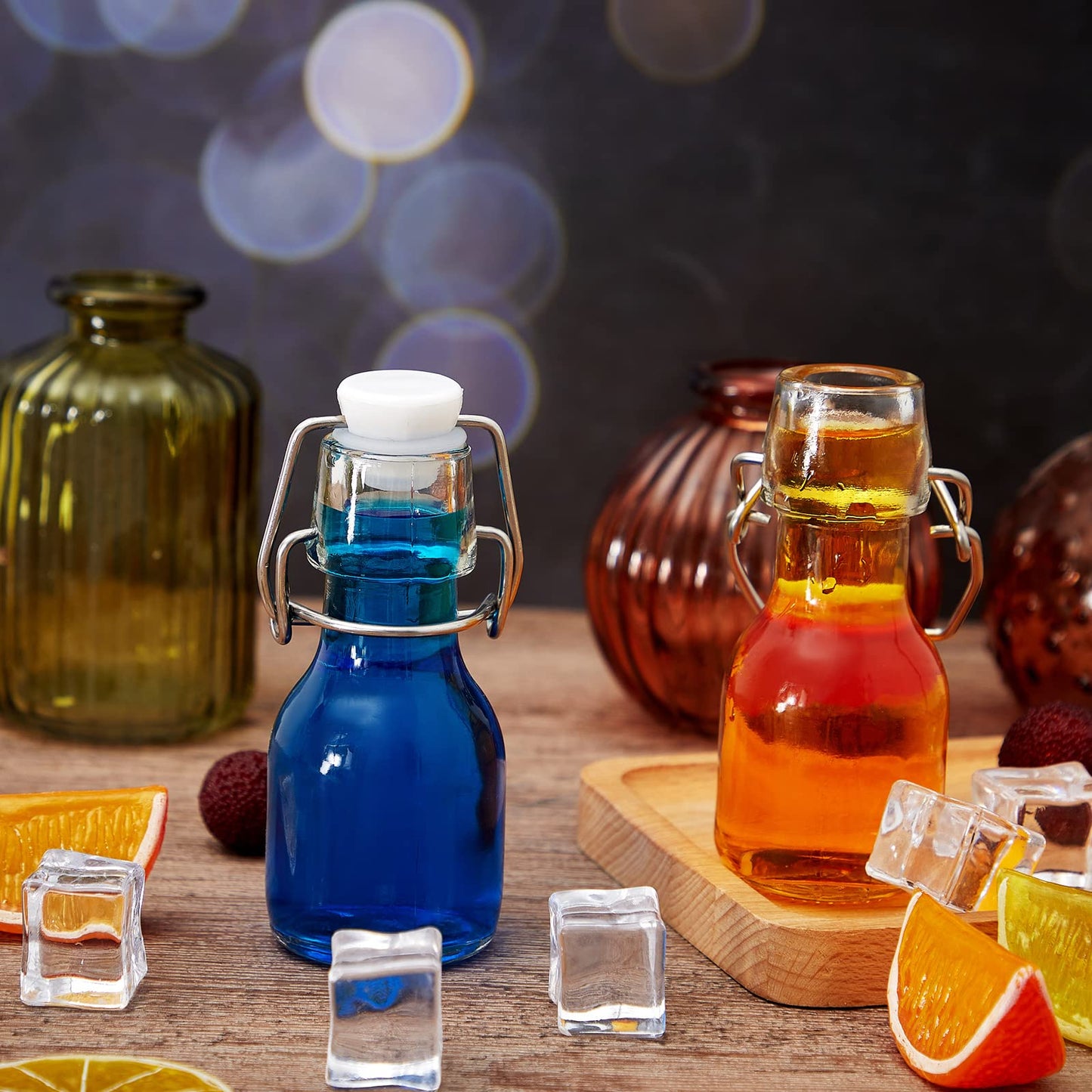 Tessco 24 Pcs Mini Swing Top Glass Bottles with Stoppers Small Flip Top Bottles with Airtight Lids for Crafts Decoration Wedding Themed Party Favors(2 oz,Transparent)
