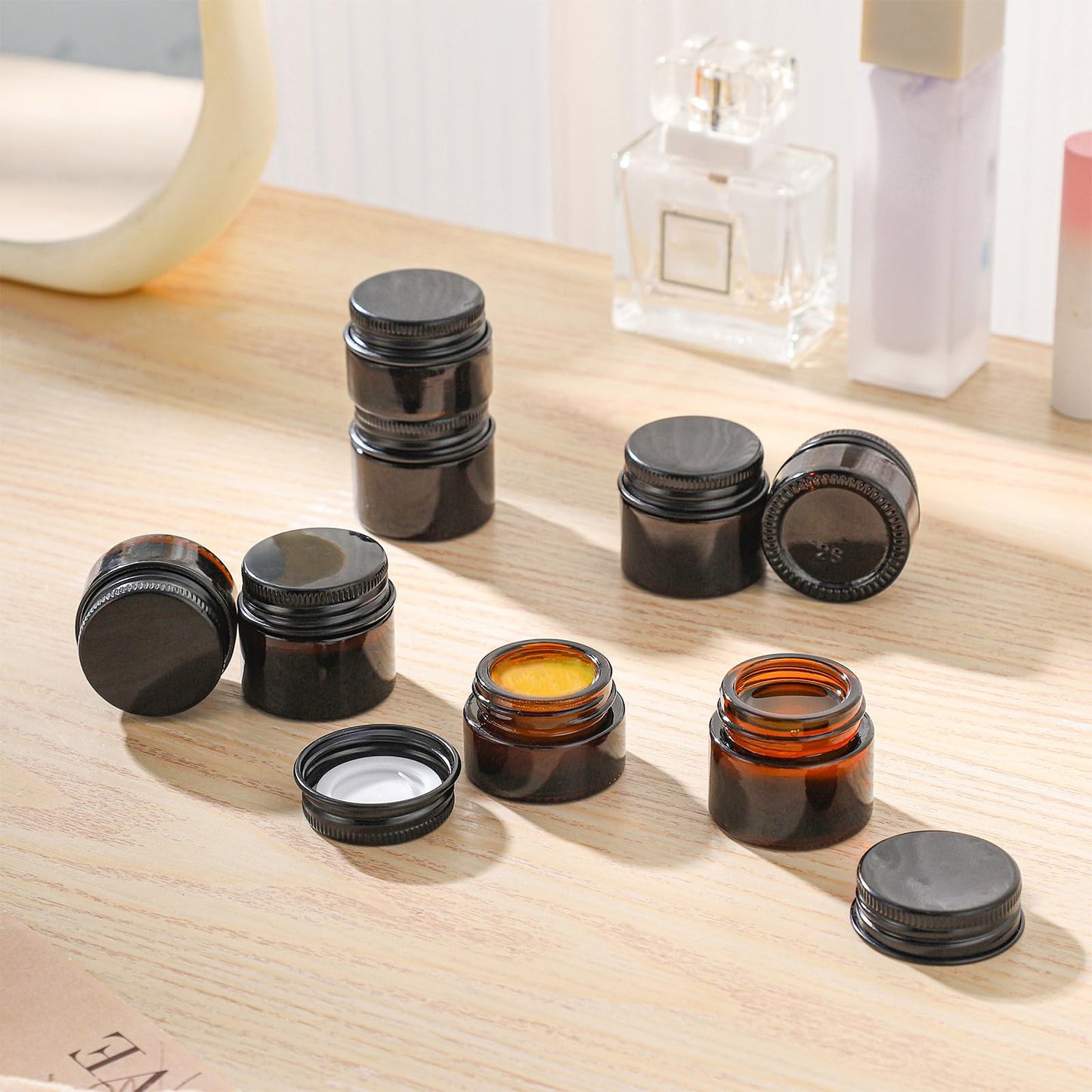RAMFIYN 24 pack 5ml Amber Glass Cosmetic Jars with Black Metal Lids Empty Lip Balm Containers with Inner Liner Tiny Sample Jar with Label for Wax Salve Lotion