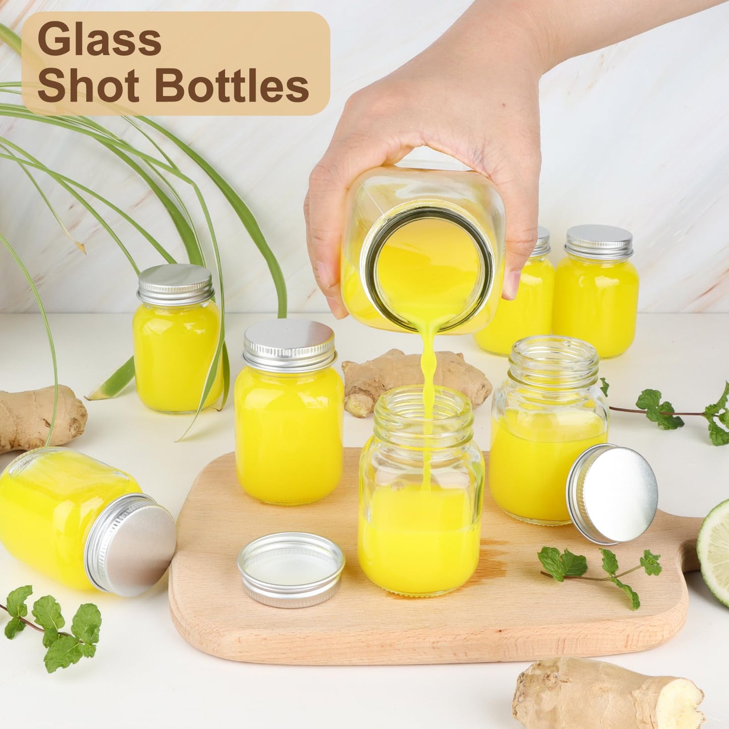 12 Pack 2 oz Mason Jars with Silver Lids, Mini Glass Jar for Ginger Shots, Small Juice Shot Bottles with Caps, Container for Wellness Beverage Storage Candle Gifts Honey Jam Spices Party Favors
