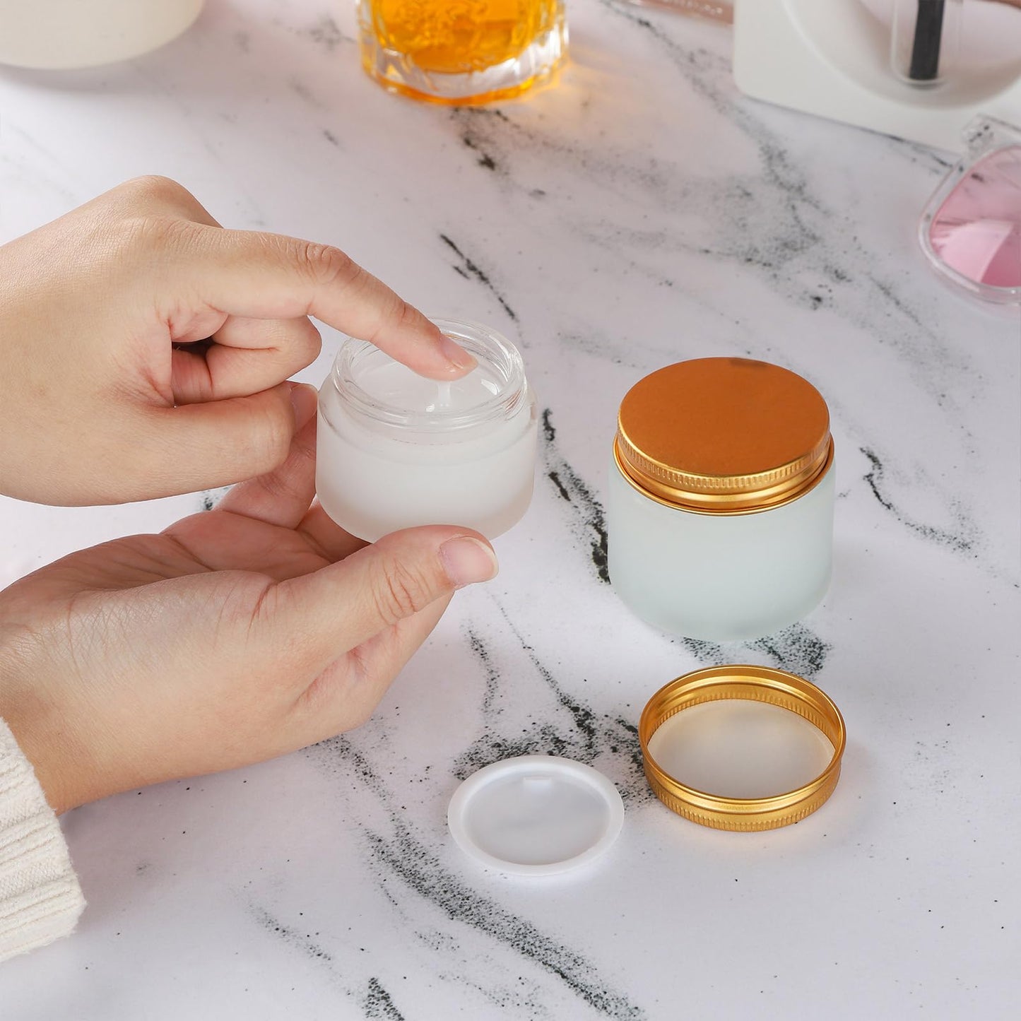 RAMFIYN 24 pack Small Clear Frosted Glass Cosmetic jars with Golden Metal Lids 2oz Bulk for Sample Lotion Cream Travel Jar Cosmetic Container