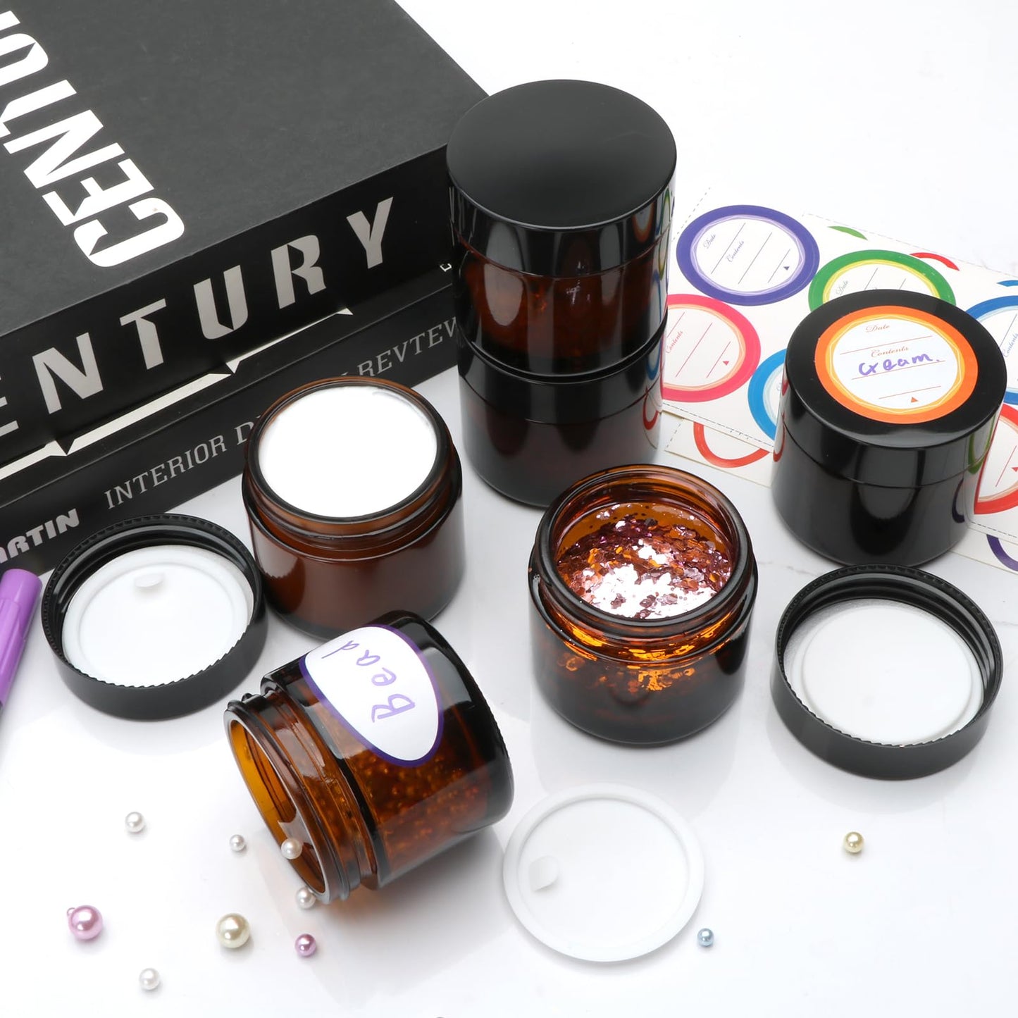 2oz Small Travel Containers with Black Lids,25 Pack Amber Glass Jars with Mini Disposable Spatula for Toiletries，Travel Storage，Makeup Beauty Products, Lotions, Powders and Ointments