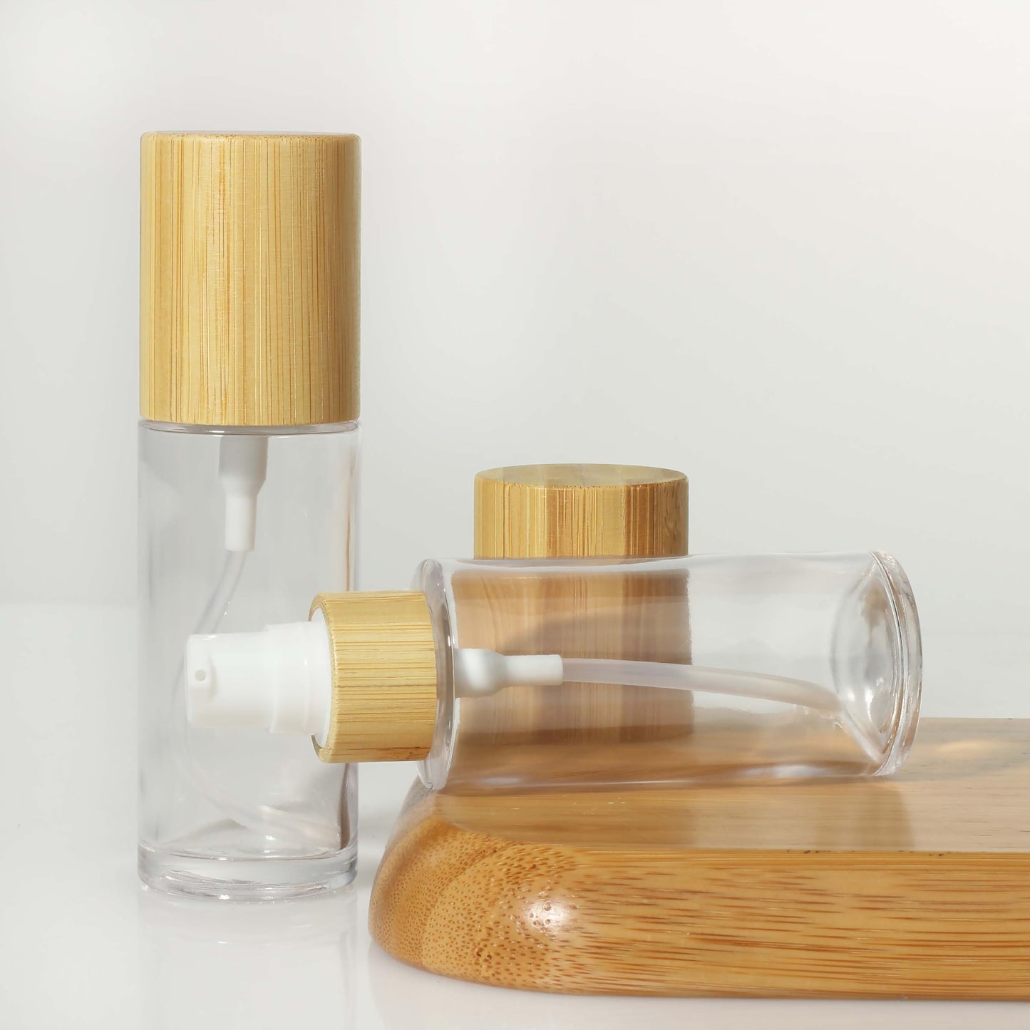 COSIDEA 6 pcs Empty 1.67oz / 50ml bamboo lids Clear glass bottle with lotion pump dispenser, refillable emulsion cosmetic cream Serum bottles, toiletries refill travel container