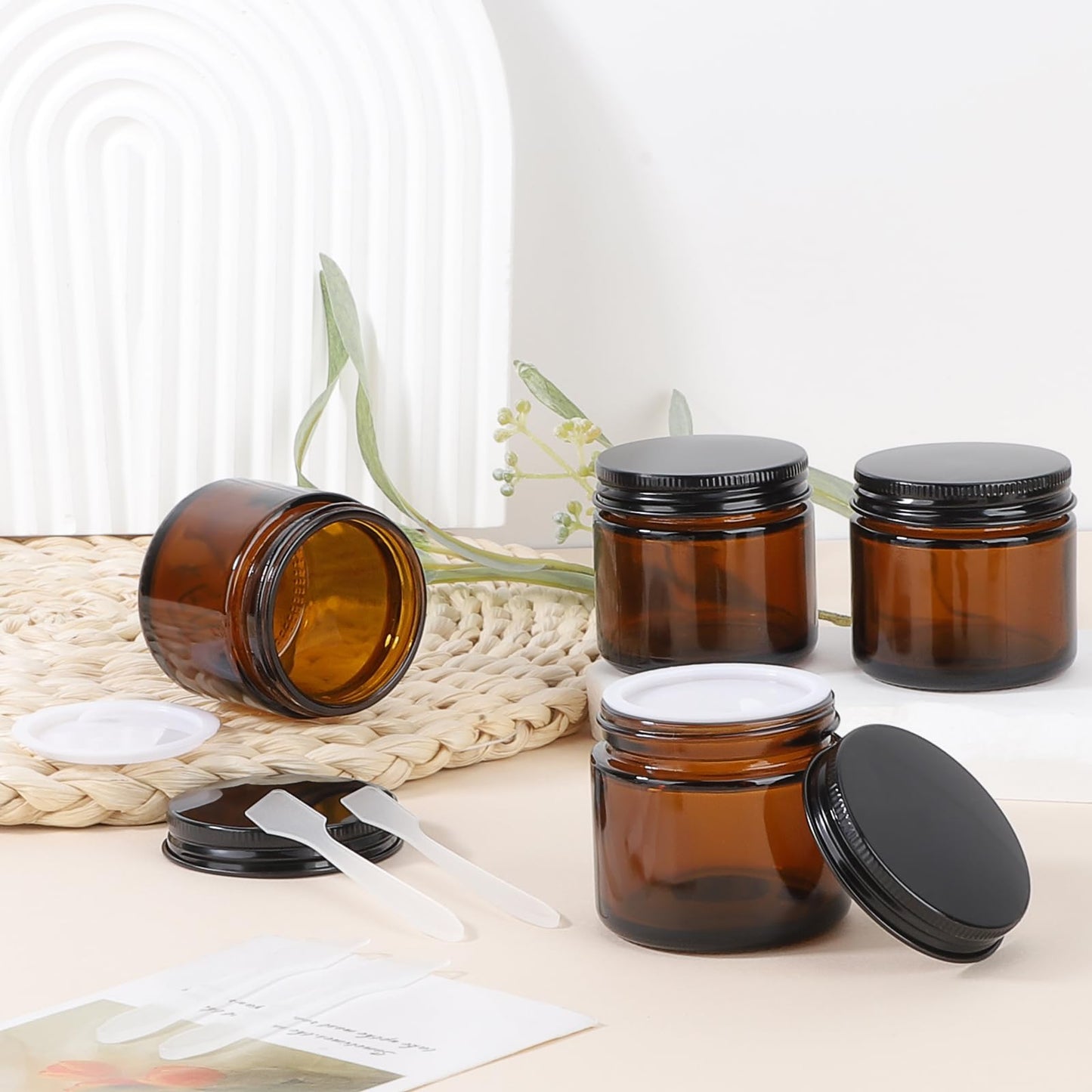 Segbeauty 2oz Amber Glass Jars with Black Lids, 4 Pack 60ml Thick Empty Round Glass Jars with Inner Liner for Cosmetics, Travel Size Containers for Toiletries, Refillable Sample Bottles for Lotion