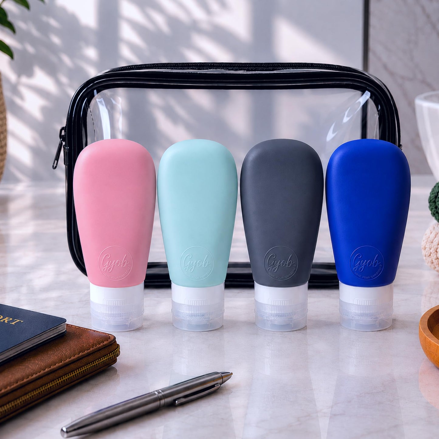 LYOB Travel Bottles for Toiletries, TSA Approved 3oz (90ml) Leak Proof Silicone Refillable Squeeze Travel Size Containers BPA Free for Cleansers, Lotions, Shampoo 4pk-With Bag (P,G,Blk,BL)