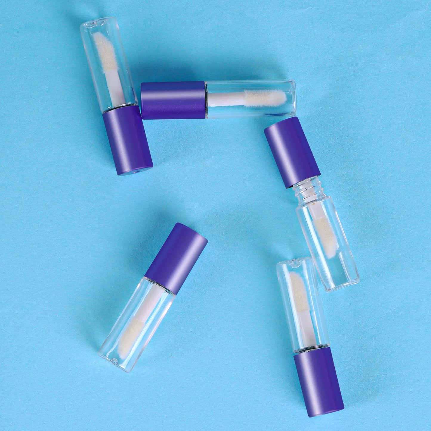 Mydio 50 Pack 1.2ML Clear Mini Lip Gloss Tube Empty Lip Balm Containers With Purple Lid for Lipstick (Purple)