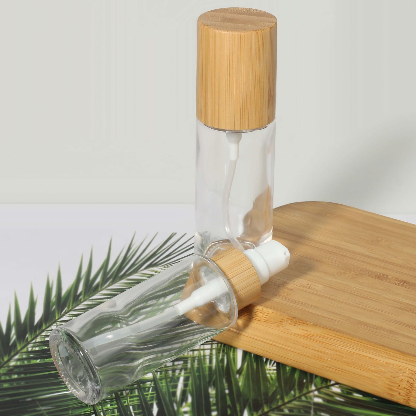 COSIDEA 6 pcs Empty 1.67oz / 50ml bamboo lids Clear glass bottle with lotion pump dispenser, refillable emulsion cosmetic cream Serum bottles, toiletries refill travel container