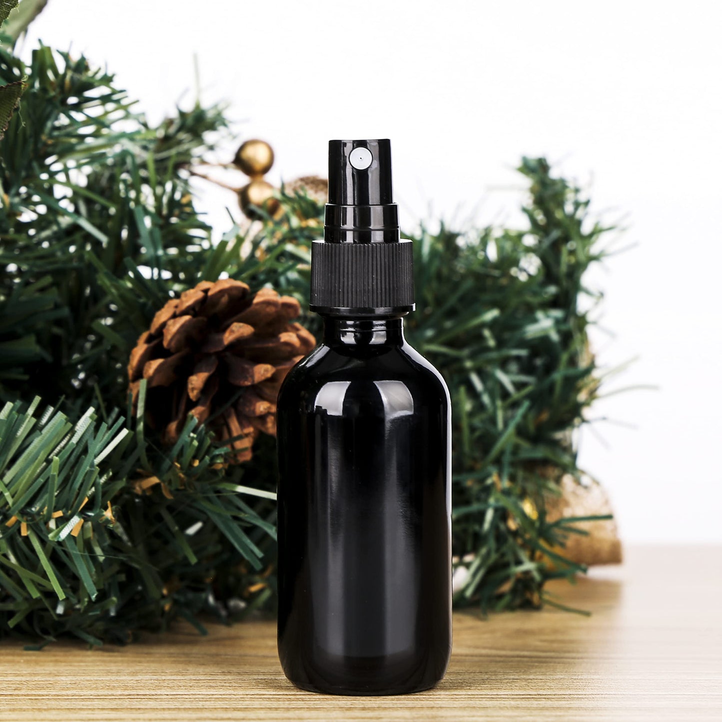 YONKAN 2oz Glass Spray Bottle, Fine Mist Boston Glass Bottles with Black Fine Mist Sprayer Small Clear Bottles for Essential Oils, Bath, Beauty, Hair & Cleaning, UV Black, Pack of 12